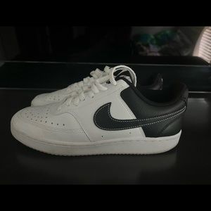 Black and white nike vision low